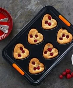 Le Creuset Herzform Gestuft, 6er 5 Le Creuset Herzform Gestuft, 6er -KitchenAid Shop Le Creuset Herzform 6er